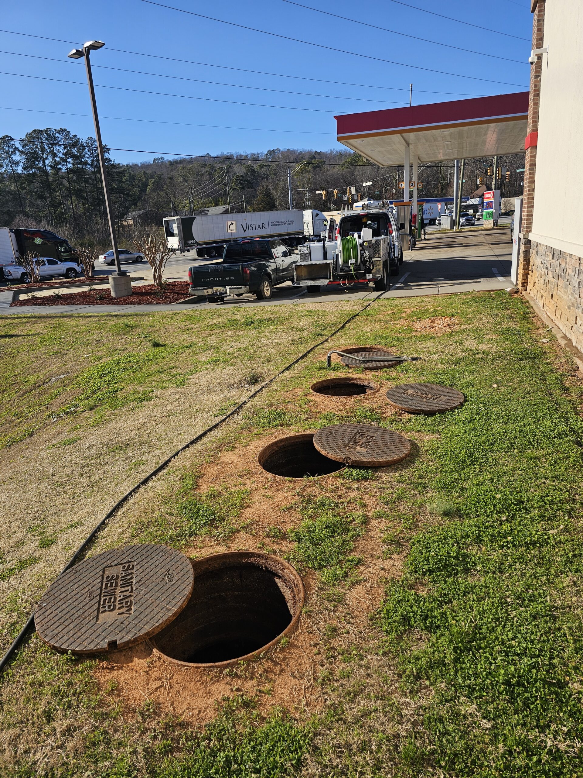 Professional plumber working in a home